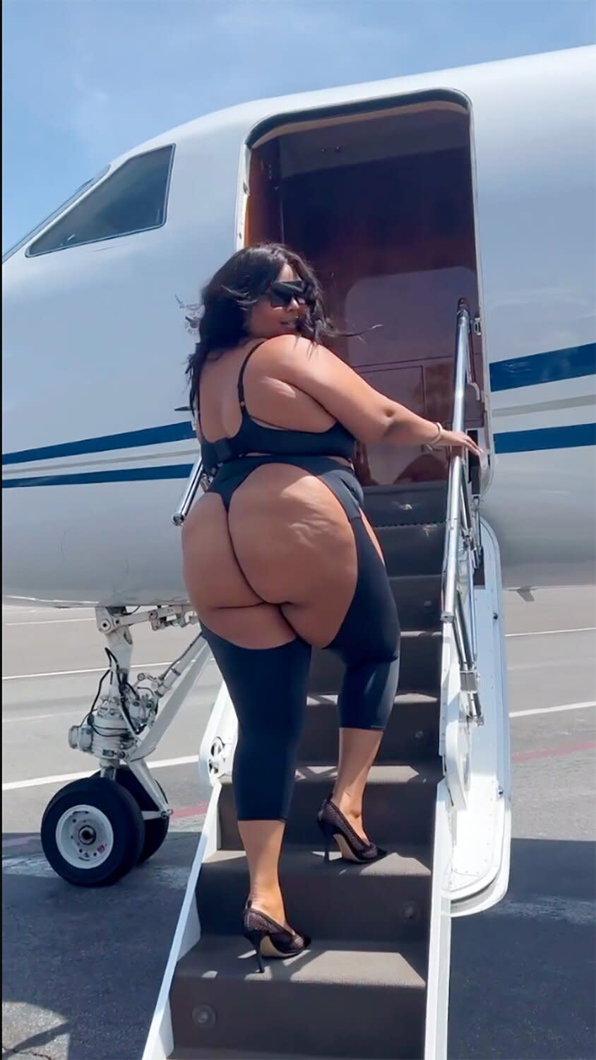 Lizzo Bares Almost All as She Boards a Private Jet in Shapewear from Her New Yitty Line