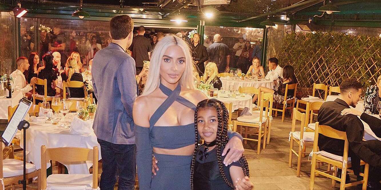 Kim Kardashian Shares Photos with Daughter North at Kourtney’s Wedding