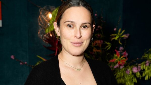 Pregnant Rumer Willis goes makeup-free as she cradles baby bump at West Hollywood event