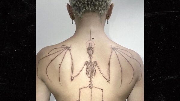 Doja Cat Gets New Bat Skeleton Tattoo After Unveiling Monster Ink