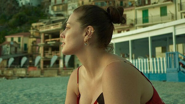World’s Sexiest Woman Ashley Graham indulges in pizza and cannolis and kisses husband Justin in new pics from Italy trip