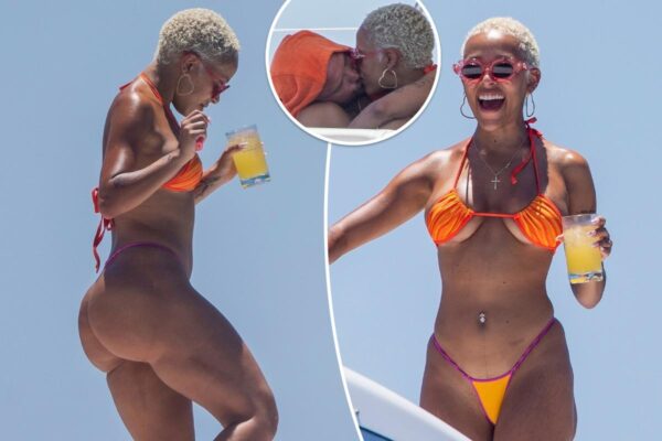 Doja Cat shows off hourglass figure in tiny bikini, packs on the PDA with J. Cyrus