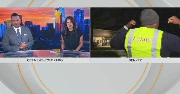 CBS News Colorado’s Justin Adams hit the streets as a “celebrity” crossing guard