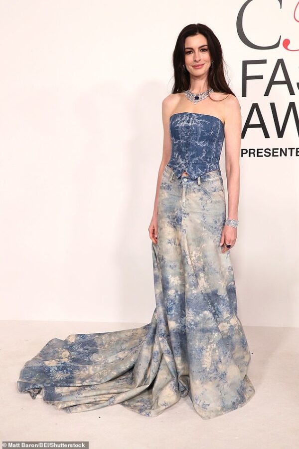 Anne Hathaway is darling in denim as she takes the CFDA Fashion Awards by storm in jean maxi skirt – before changing into sexy red dress