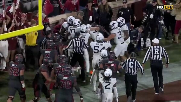 A scuffle breaks out between West Virginia and Oklahoma after Drake Stoops is hit in the endzone