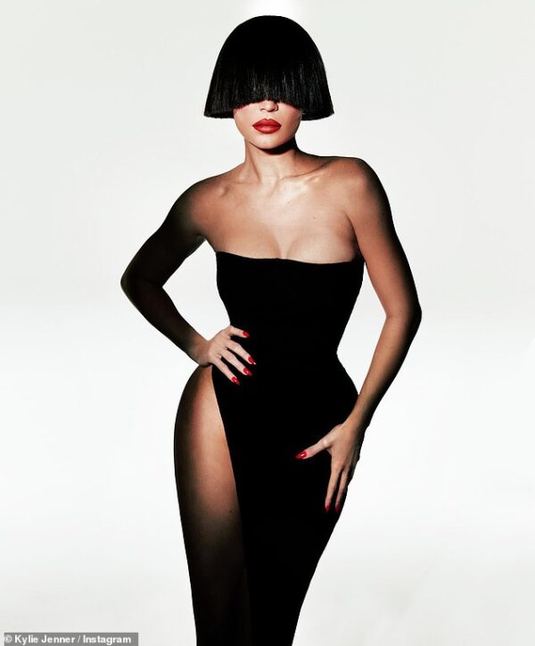 Kylie Jenner channels Sia while wearing a jet-black wig during a promotional photo shoot for Kylie Cosmetics