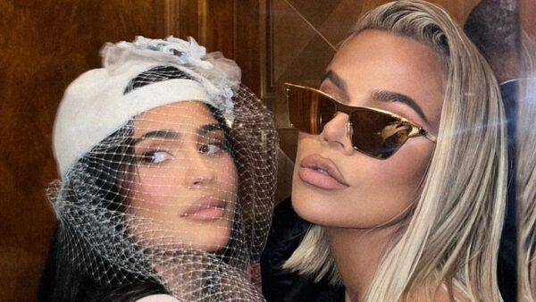 Khloe Kardashian and Kylie Jenner reveal their shrinking butts in skintight glittery dresses as they slow dance at party