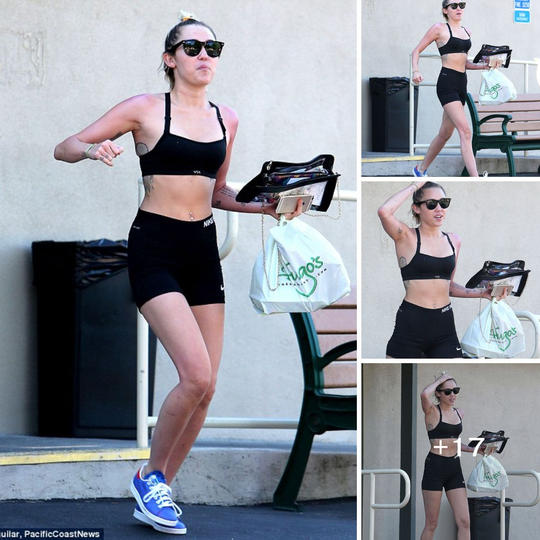 Miley Cyrus Flaunts Toned Midriff in Sporty Outfit on Relaxed Outing for Lunch