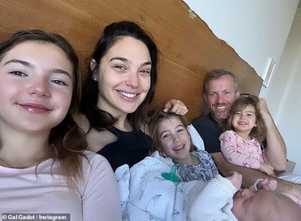 Gal Gadot shares FIRST look at newborn daughter Ori’s face after shock baby announcement as she poses for family photo