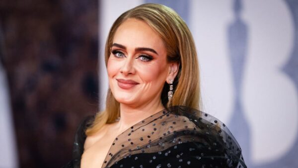 Adele showcases slim physique in jaw-dropping tight black dress for Pride