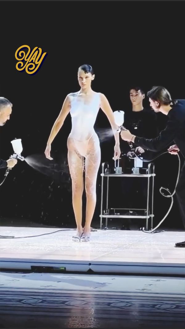 The iconic moment of coperni show 2023 dress made from spray on Bella Hadid ???? #gigihadid #bellahadid #inshorts