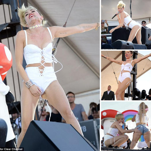 Miley Cyrus steps out in nipple pasties and fishnet dress after twerking and grabbing her crotch at iHeartRadio Music ‎