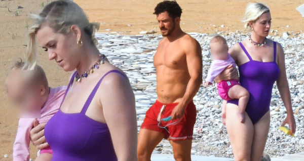 Radiant in purple Katy Perry embraces motherhood and beach vibes in Greece with Orlando Bloom and baby Daisy Dove.