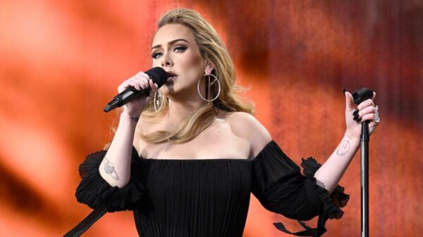 Adele Sports Glamorous Black Dress For First Concert In Five Years