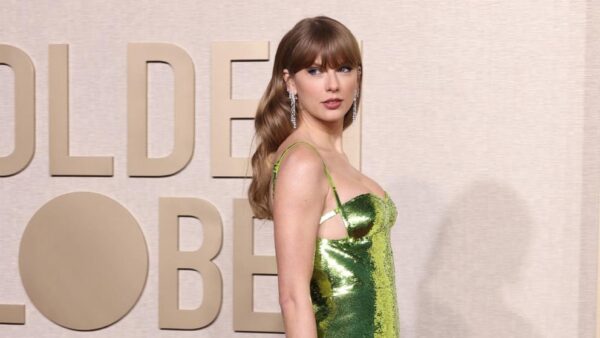 Golden Globes 2024: Taylor Swift steps out on red carpet in green gown