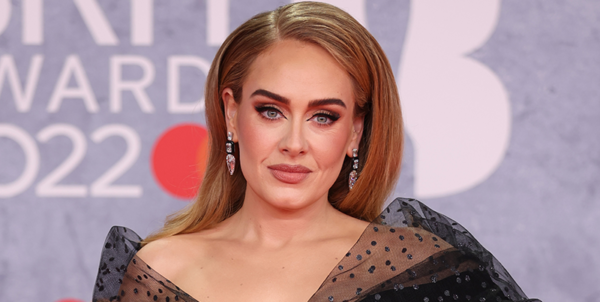 Adele’s plunging BRITs dress will take your breath away