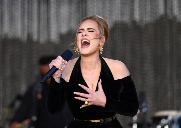 Adele Sparkles in Louis Vuitton & Schiaparelli Gowns at London Concert