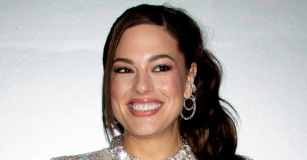 Ashley Graham Stuns in Figure-Hugging Little Black Lace Dress With See-Through Corset
