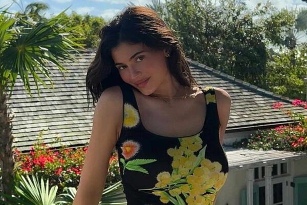 Kylie Jenner Poses with Flowers During Tropical Vacation