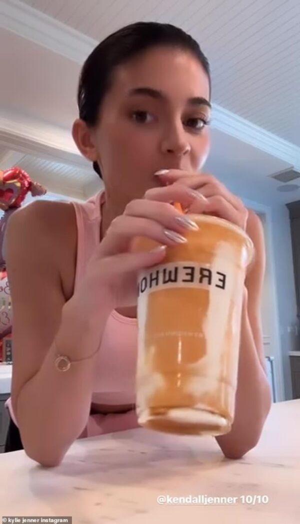 Kylie Jenner supports sister Kendall Jenner as she tries and rates the model’s new $23 Peaches and Cream Erewhon smoothie