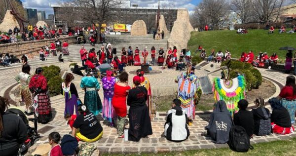 Dozens gather to mark Red Dress Day in Winnipeg