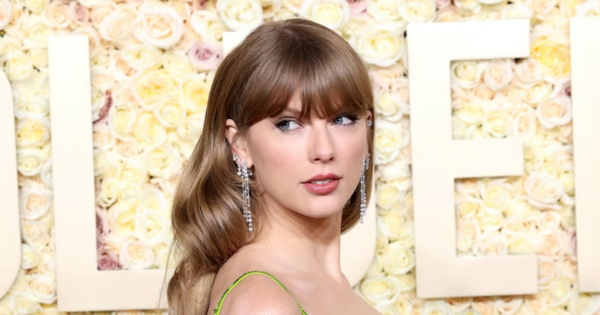 Taylor Swift’s 2024 Golden Globes Dress Was Snake Green A La ‘Reputation’