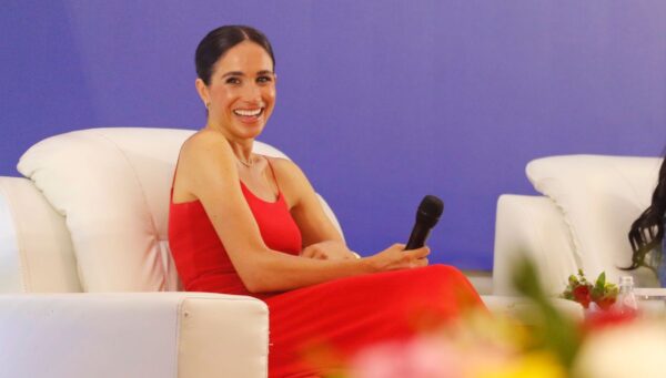 Meghan Markle Explains Why She Wore a Bright Red Dress in Nigeria
