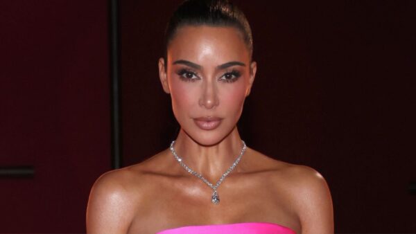 Kim Kardashian Puts an Edgy Spin on Barbiecore With a Hot Pink Gown and Black Opera Gloves