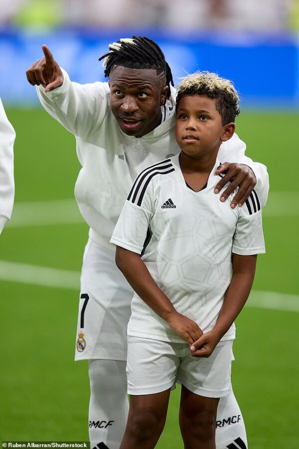 Kim Kardashian’s son Saint, 8, walks out with Real Madrid star Vinicius Jnr as a mascot for Spanish soccer giants