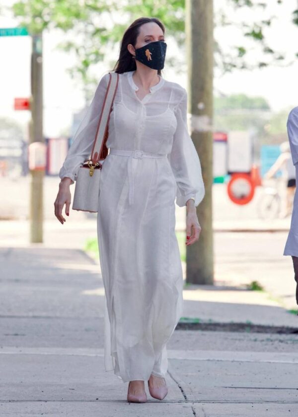 Stepping out in Brooklyn with elegance and grace. Angelina Jolie sure knows how to shine on a glamorous evening.